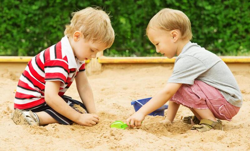 two-children-playing-in-sandbox.jpg